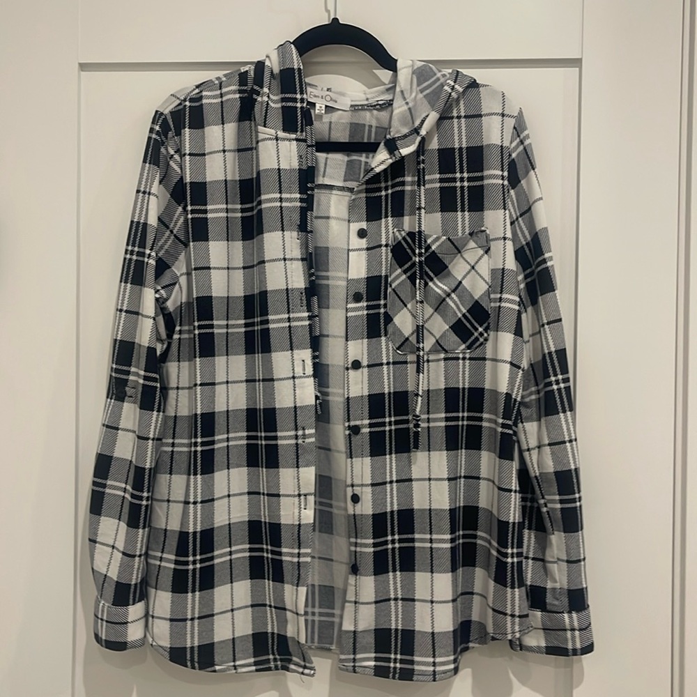 Button down plaid shirt with hoodie and button sleeve